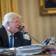 Photo of President Donald Trump speaking on the phone with Russian President Vladimir Putin Saturday, Jan. 28, 2017 via AP